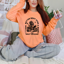 Load image into Gallery viewer, I Look Better Bent Over A Book
